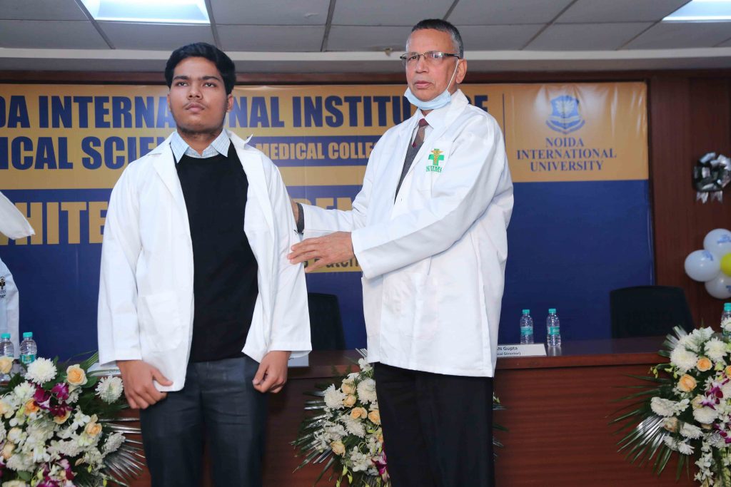white coat ceremony outfit men